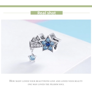 Detail of S925 sterling silver shooting star charm with blue and white cubic zirconia