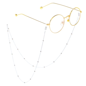 Fashionable gold round frame glasses with a matching silver bead metal neck strap