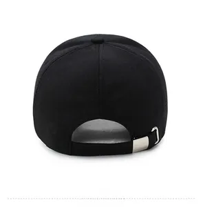 Detailed back view of a black twill baseball cap with an adjustable silver metal buckle