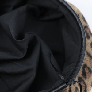 Stylish leopard print beret with black leather trim and soft lining for women