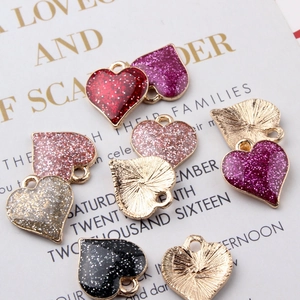 Sparkly glitter heart charms in various colors with golden alloy base for DIY jewelry