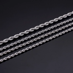Polished silver stainless steel twist chain necklaces in four sizes on black background