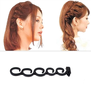 Detail showing hair styling tools with before and after braiding results on black plastic