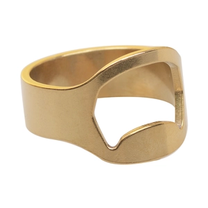 Close-up of golden stainless steel bottle opener ring with detailed opening mechanism