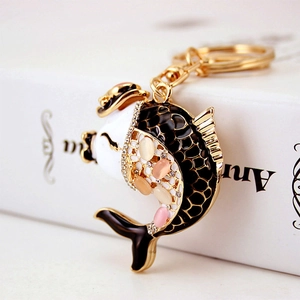 Elegant koi fish keychain with black white enamel and shimmering crystal rhinestones