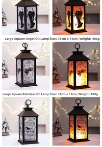 Detail view of 31cm decorative Christmas lantern with warm flame light and festive patterns