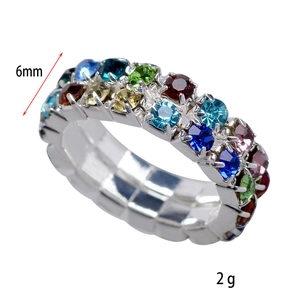 Detail view of 6mm multi-colored crystal stretch ring in silver-tone alloy, 2g weight