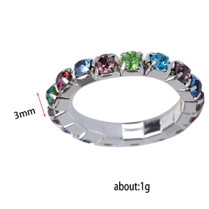Detail view of 3mm wide silver elastic ring with multi-colored crystals and 1g weight