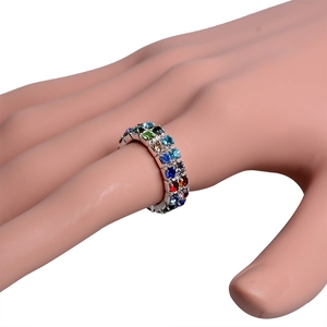 Close-up of triple-row colorful crystal stretch ring on model showing rainbow rhinestones