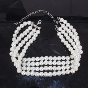 Elegant four-layer white faux pearl choker necklace with silver-tone lobster clasp