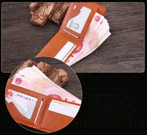 Detail of a brown men's wallet showing multiple card slots and spacious inner compartments