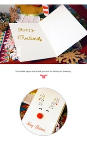 Close-up of Christmas card featuring a cute 3D red pompom nose reindeer and blank inner page