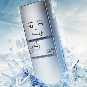 Cartoon fridge magnet on silver refrigerator breaking through ice cubes with sky background