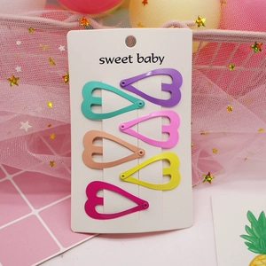 6-piece colorful heart-shaped hollow metal hair clips set for girls on display card