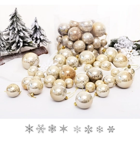 Close-up of champagne gold Christmas balls in various sizes for festive tree decoration