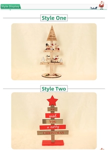Close-up of DIY wooden Christmas tree blocks featuring Santa motifs and holiday greetings