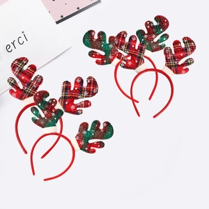 Set of four Christmas reindeer antlers headbands with festive plaid and snowflake patterns