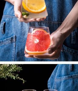Detailed scene of Mount Fuji glass cups filled with fresh orange and grapefruit slices