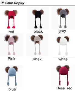 Color display of children knitted earflap hats with pom-poms in eight different colors