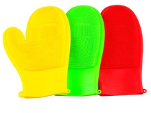 Three colorful silicone heat-resistant oven mitts with anti-slip texture on white backdrop