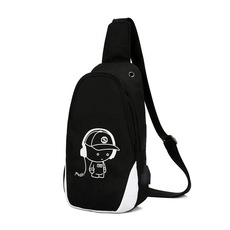 Detail of black crossbody bag with white cartoon graphic and integrated USB port