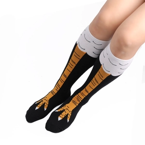 Funny over-the-knee chicken leg socks featuring creative knit pattern and orange claws