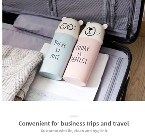 Portable travel toothbrush holder set in pink and blue with cute white bear caps