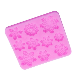 Pink silicone snowflake mold for Christmas fondant cake decorating and DIY chocolate