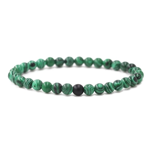 6mm distance bracelet with green malachite beads and a single black matte bead