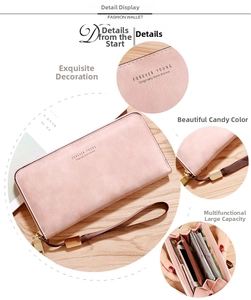 Detail view of pink long wallet with multiple card slots and smartphone compartment