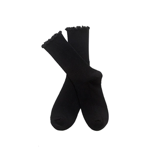 Black knit cotton socks featuring a vintage ruffled edge and high-quality ribbed texture