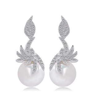Elegant long pearl drop earrings with zircon leaf design in silver finish on white background