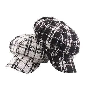 Set of two vintage plaid newsboy hats in black and white tweed with short brims