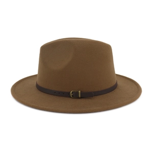 Detail of a brown fedora hat featuring a leather band and metallic square buckle accent