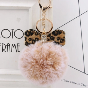 Leopard print bow plush ball keychain with golden clasp and rhinestones for handbags