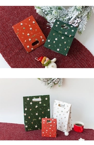 Multi-angle view of red, green, and white Christmas gift bags with festive holiday patterns
