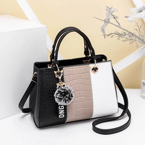 Women's tricolor patchwork tote bag in crocodile embossed leather with plush charm