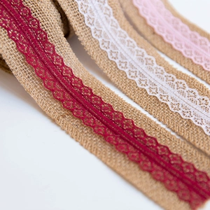 Natural jute burlap ribbon with delicate lace trim in red, white and pink for Christmas decor
