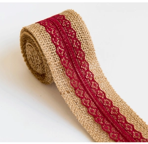 Detailed close-up of natural burlap ribbon with red lace trim for Christmas decor