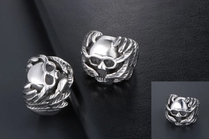 Detail view of gothic skull ring in vintage silver S925 sterling silver with wing carvings