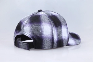 Detail view of the purple and black plaid cotton baseball cap with adjustable strap