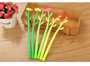 Detail of camellia pens featuring soft silicone flower petals and green leaf barrels