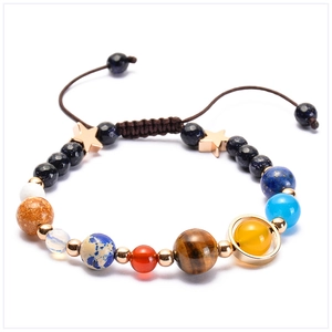 Close-up of solar system eight planets natural stone bracelet with adjustable cord