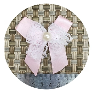 Pink silk bowknot hair accessory with lace layer and pearl center, 5cm width detail