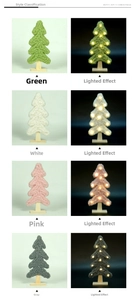 Detail of wool knit Christmas tree ornaments with wooden base and LED lights in 4 colors
