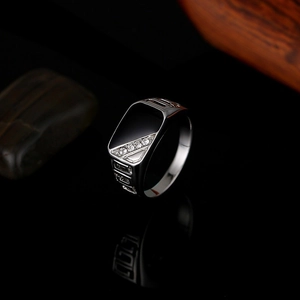 Silver men's ring with black rectangular inlay and micro-pave crystals on black mirror surface