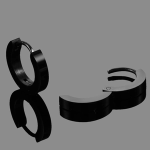 Macro view of black stainless steel hoop earrings with glossy finish and mirror reflection
