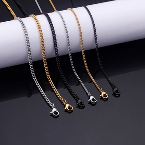 Set of stainless steel curb chain extenders with lobster clasps in gold, silver, and black