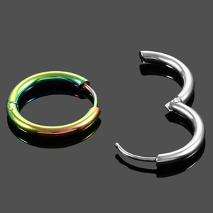 Detailed shot of rainbow and silver stainless steel hoop earrings with hinge mechanism