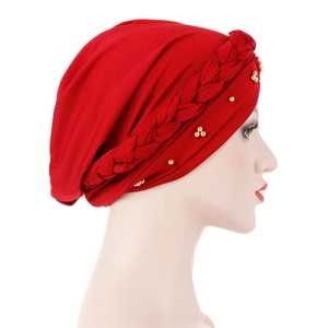Solid red turban hat featuring braided band and gold bead accents for women